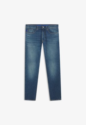 Mørkeblå denimjeans med rett ben. Har fem lommer, beltehemper og en subtil falming på lårene. Merkelapp i livet.