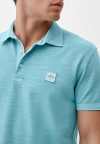 s.Oliver MIT FLAMM STRUKTUR - Poloshirt - helles türkis