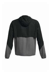 Chaqueta con capucha que presenta una sección superior negra y una sección inferior gris, hecha de un tejido suave con mangas largas y puños elásticos.