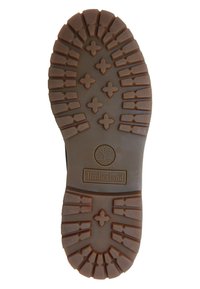 Brun gummisål med dybe riller, der har et cirkulært logo og korsmønstre, som er karakteristiske for Timberland mærkets fodtøjsdesign.