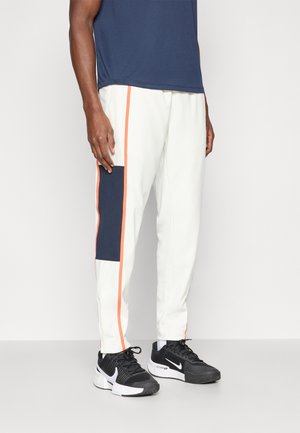 Pantalon de survêtement - sail/turf orange