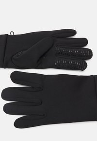 Gants noirs fabriqués à partir d'un matériau flexible, présentant un motif de préhension texturé sur les paumes et les doigts, conçus pour une meilleure utilisabilité.