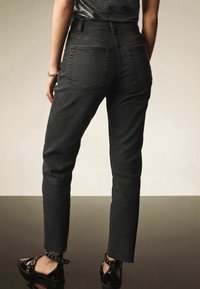 Next TALL  - Liibuvad teksad - black
