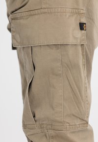 Alpha Industries AIRMAN - - Cargohose PANT taupe