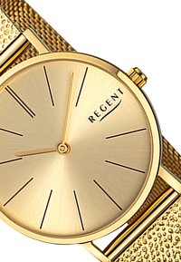 Montre bracelet en or avec un cadran rond, un bracelet en maille texturée, un design minimaliste et le nom de la marque "REGENT" près du haut.