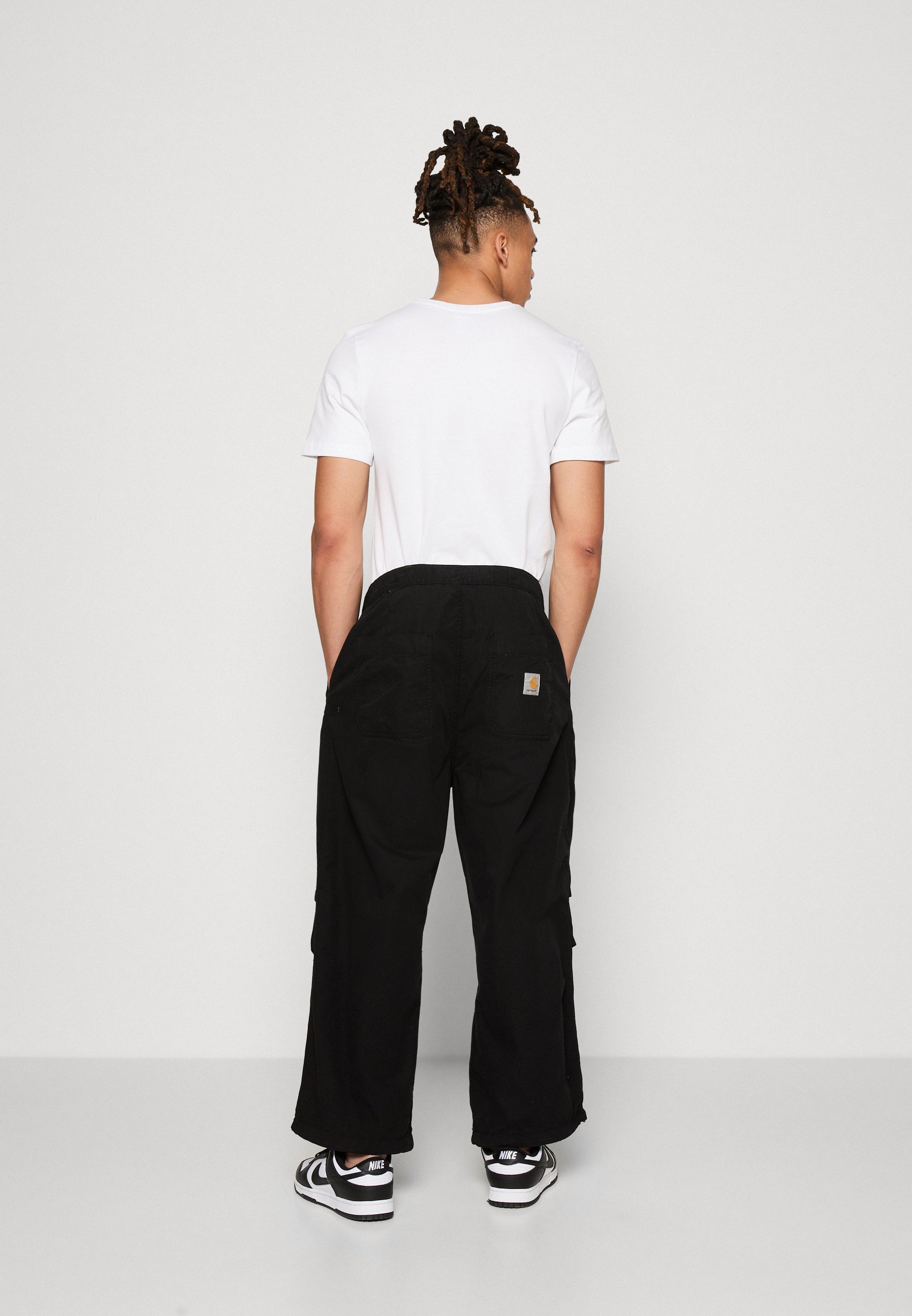 Carhartt WIP JUDD PANT - Trousers - black/black - Zalando