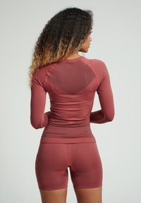 Hummel FIRST SEAMLESS - Apatiniai marškiniai - marsala