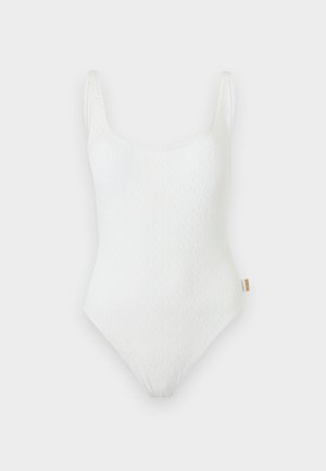 Maillot de bain une pièce blanc en tissu texturé, encolure arrondie et fines bretelles, présenté à plat sur un fond clair.