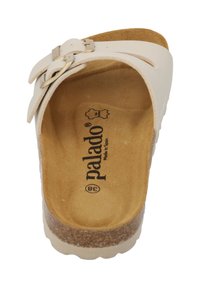 Sandalo bianco con suola in sughero e footbed testurizzato, dotato di una sola fascia e di una fibbia regolabile per una calzata sicura.