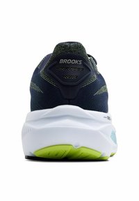 Scarpa da corsa Brooks con tomaia in rete blu navy, suola esterna verde lime a contrasto e intersuola bianca. Presenta un tallone imbottito e dettagli del logo.