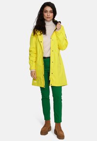 Huppa JANELLE - Lengva striukė - yellow