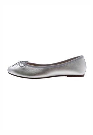 Silver ballet flats with a textured, metallic finish, rounded toe, and a decorative bow on the front. Soft elasticized trim around the opening.