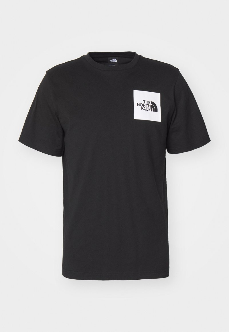 Camiseta de algodón negra con manga corta, cuello redondo y un logo cuadrado blanco en el pecho que presenta el texto "The North Face" y un diseño curvado.