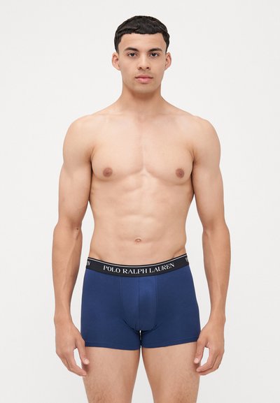 Boxer brief in blu navy con elastico nero che presenta il testo "POLO RALPH LAUREN". Tessuto morbido, taglio aderente e senza motivi o accenti visibili.