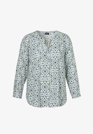 Blouse à manches longues avec un motif géométrique bleu et blanc, encolure ronde avec une fente centrale courte, et coupe décontractée.