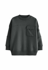 Felpa oversize grigia scura con collo rotondo a coste, tasca laterale e maniche ampie. Tessuto morbido e liscio con un design informale.