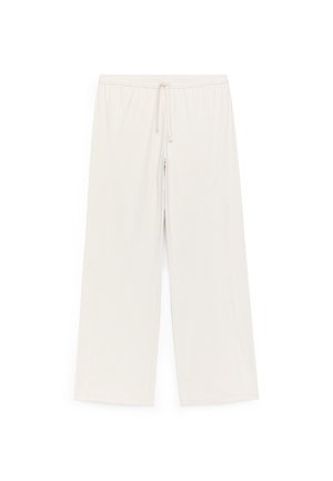 Pantalon large beige clair en tissu doux. Caractéristiques : taille élastique avec cordon de serrage, texture lisse, sans motifs apparents.