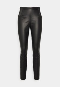 Pantalons en cuir noir ajustés, avec des panneaux latéraux texturés et une taille haute. Surface lisse avec un léger éclat.