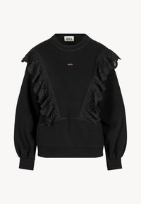 Czarny sweatshirt z falbany z ażurowymi detalami na ramionach, prążkowanymi mankietami i małym metalowym logo na klatce piersiowej. Miękka tekstura materiału.