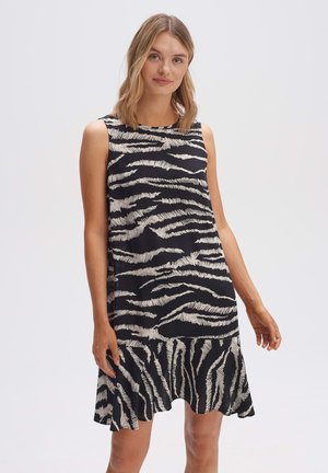 Sleeveless, knee-length dress in black with a white zebra pattern. Fabric has a soft texture and a flared hemline.