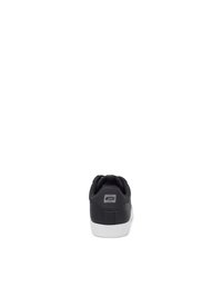 Black sneaker with textured leather, padded collar, and white rubber sole. Features a rectangular logo on the heel. Clean, minimal design.
