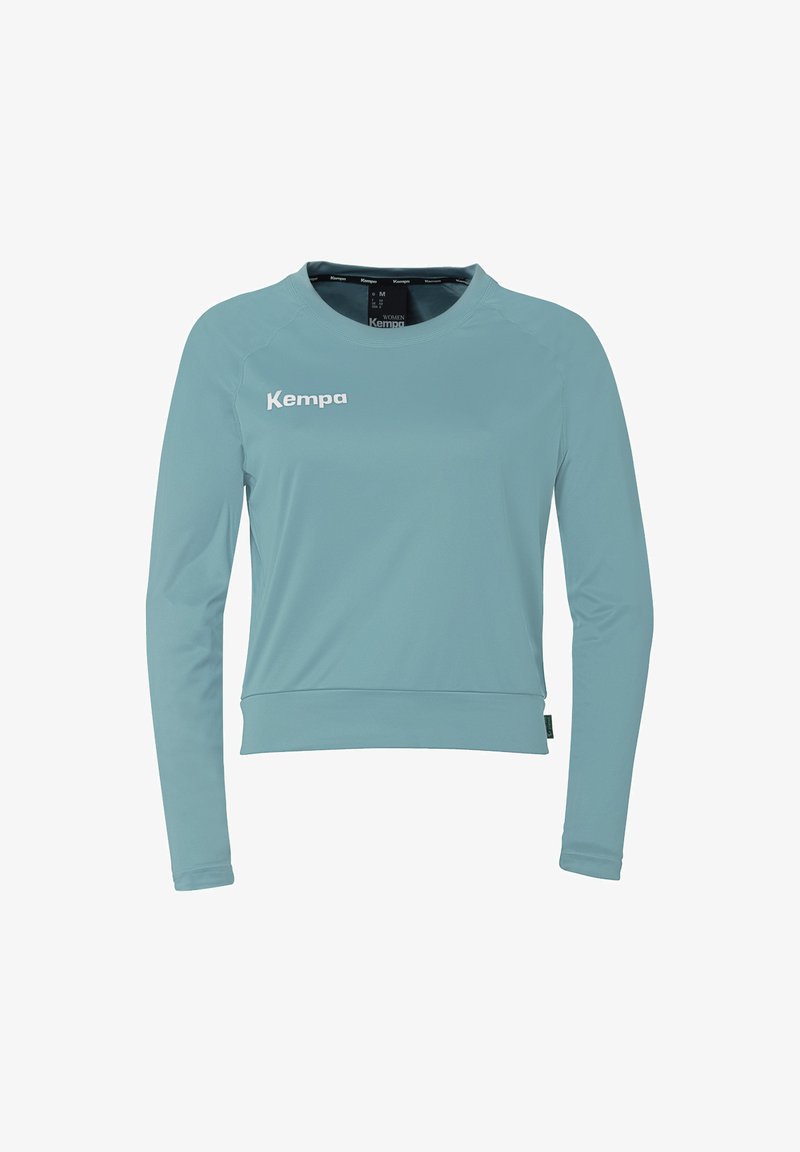 Lichtblauw longsleeve shirt van soepel stof, met een ronde halslijn en een wit "Kempa" logo op de borst.