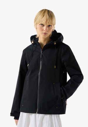 Hunter ORIGINAL ORIGINALS LIGHTWEIGHT WATERPROOF JACKET - Overgangsjakke - black