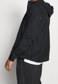 Nike Performance Giacca da running - black