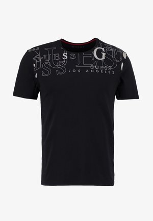 Zwart katoenen T-shirt met korte mouwen. Voorzien van witte tekst "GUESS LOS ANGELES" en herhaalde logodesigns in verschillende maten. Ronde halslijn.