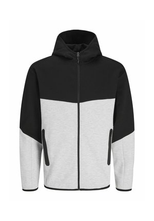 Hoodie mit schwarzem oberen Abschnitt und grauem unteren Abschnitt. Hergestellt aus weichem Material, mit Reißverschlusstaschen und einem Reißverschluss vorne.