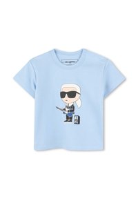 Lichtblau T-shirt van katoen, met een cartoonafbeelding van een figuur met een zonnebril, die een gitaar vasthoudt en een luidsprekericoon.
