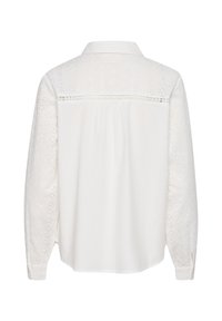 Cămașă albă cu mâneci lungi, având detalii din dantelă pe mâneci și pe spate, material moale și un design clasic al gulerului.