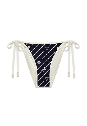 Bas de bikini bleu marine et blanc avec rayures de corde nautique, symboles de boussole et de nœud, liens latéraux avec accents de charme doré.