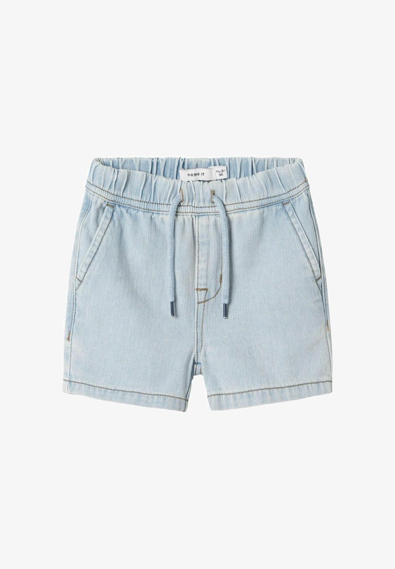 Gaiši zili džinsu šorti ar elastīgu jostu un auklu. Iespējas, sānu kabatas un smalkas šuvju detaļas.