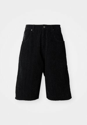 Black corduroy shorts with a textured vertical rib pattern, featuring front pockets and a button closure. Mid-thigh length.
