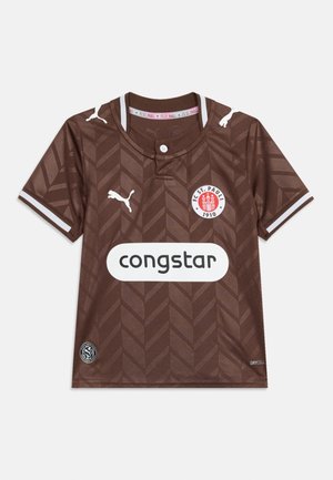 Maillot de football marron du FC St. Pauli avec logos Puma blancs, écusson du club, sponsor Congstar et un motif chevron subtil.