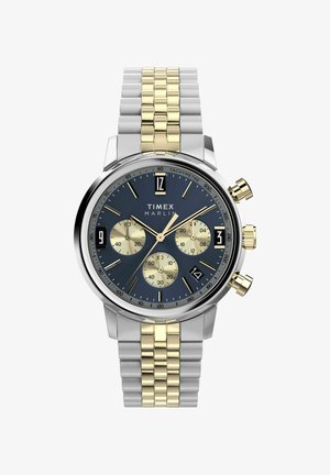 Orologio Timex Marlin con quadrante blu, cinturino in acciaio inox argentato e dorato, tre sotto-quadranti e una finestra della data alle quattro.