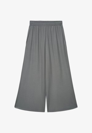 Pantaloni grigi a gamba larga con vita elasticizzata e tasche laterali, realizzati in tessuto morbido e leggero per un comfort casual.