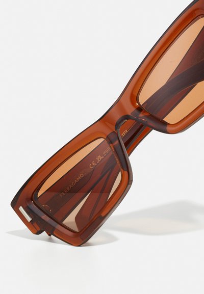FERRAGAMO UNISEX - Sunglasses - transparent brown
