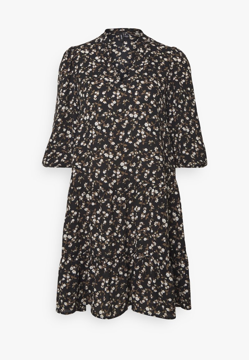 Robe noire à fleurs avec un col, des manches bouffantes et une jupe à volants ornée de petites fleurs blanches et brunes.