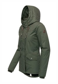 Olive green insulated jacket with a hood, featuring a zip closure, two front pockets, adjustable drawstrings, and a logo patch on the sleeve.