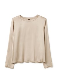 Camicia beige a maniche lunghe realizzata in tessuto leggero e morbido. Presenta un collo rotondo e una vestibilità comoda, con orlo dritto e cuciture minime.