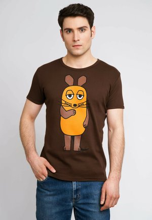 Brown jersey t-shirt featuring a cartoon character with an orange body, brown ears, and whiskers; paired with blue denim jeans.
