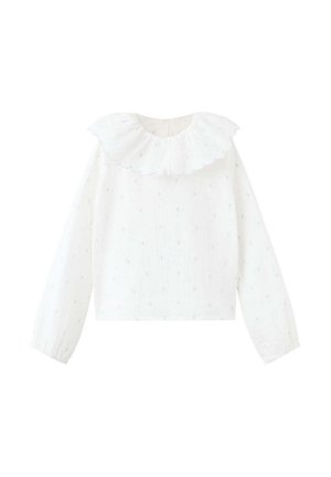 Blouse blanche à manches longues avec petite texture à pois et grand col à volants avec bords festonnés, poignets élastiques et encolure ronde.