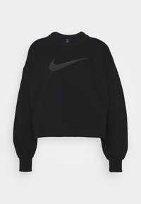 Sweatshirt court noir en tissu doux. Présente un logo Nike noir avec des accents scintillants sur le devant, et des manches volumineuses.