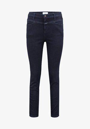 Jeans ajustados de denim en azul oscuro. Presentan un cierre con botón, bolsillos frontales y trabillas para cinturón. Textura suave con detalles de costura mínimos.