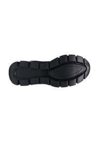Sottopiede di scarpa sportiva nera con una superficie testurizzata e modelli di battistrada distintivi, che offre aderenza e supporto per varie attività.