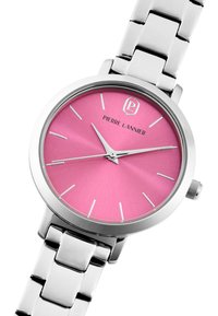 Reloj de acero inoxidable con caja redonda, esfera con acabado sol de color rosa, marcadores de hora plateados y pulsera de eslabones pulidos. Presenta el logo y la corona.