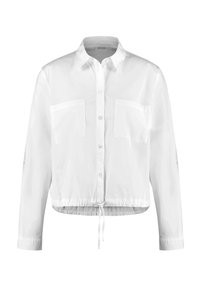Weißes cropped Shirt mit Kragen, langen Ärmeln und zwei Brusttaschen; verfügt über einen Kordelzugsaum für eine verstellbare Passform. Glatte Textur.