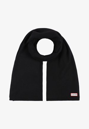Écharpe noire en tricot pliée avec une étiquette du logo Hunter cousue à une extrémité, sur fond blanc.